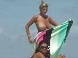 2 busty girls braless on beach