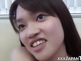 Japanese teenie presents her sweet little pussy in close up