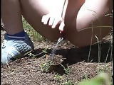 busty blonde teen pissing in forest