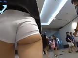 Asian ass oozing out of shorts