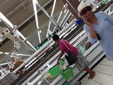 Ebony MILF with sunhat and ass under short denim skirt