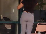 Cute Asian Girl Washing Windows 