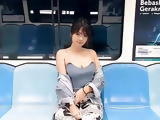 Malay Girl doing a short video in the train