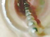 Japanese girl messes with her cervix