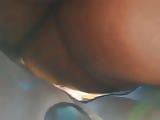 Lovely ebony Milf Upskirt in a short dress 
