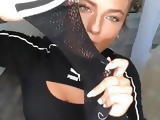 Jade Chynoweth in tight black outfit, upskirt