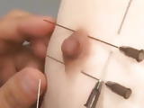 Suspended japanese pain slave gets needles in her tits