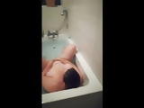 My buttocks and back in the bath and fingering myself 